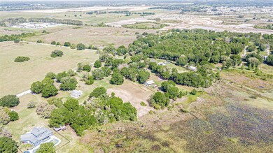 view from over near the lake back to the property