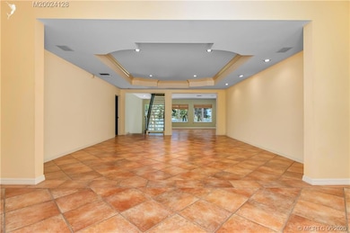 Tiled floors for easy living. High ceilings for an