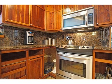 Custom kitchen with unfinished cabinets.