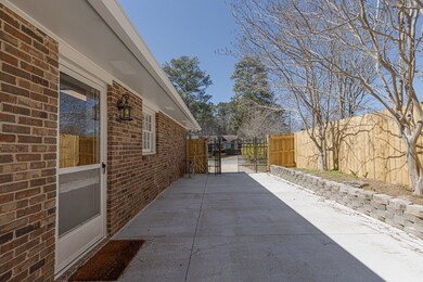 Side Carport w/gated Fence