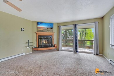 Corner Fireplace & Sliding Doors To Deck