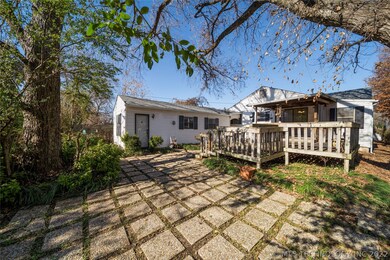 Generous backyard with mature trees, pavers & larg