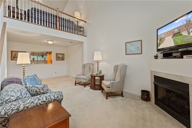 Step inside to find a living room w/ gas fireplace