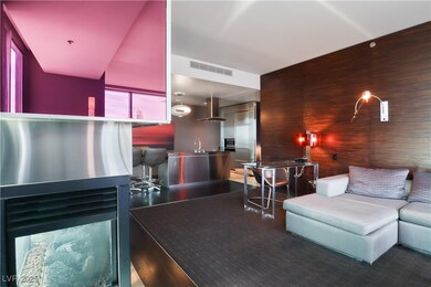 Living area featuring wooden walls
