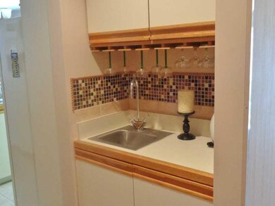 Kitchen. Handy Wet Bar, close to Kitchen.