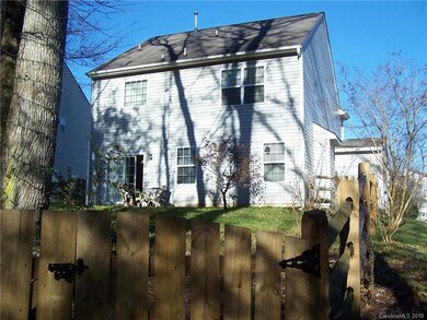VIEW FROM CORNER OF BACKYARD