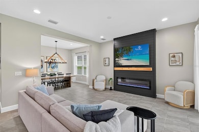 Family Room with Custom Accent Wall & Electric Fireplace