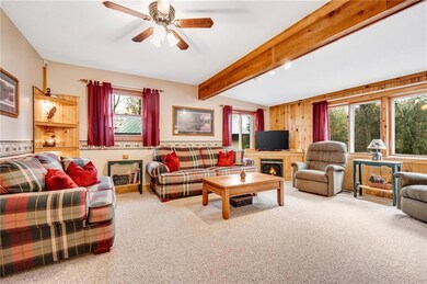 Main living area with cozy corner fireplace
