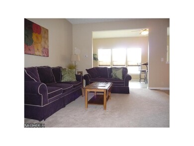 Great room opens up to Morning Room (Sun Room in M