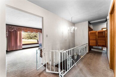 The entry opens to the spacious living room with a