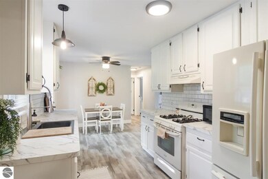 112 N Brand St, Elk Rapids, MI 49629 - photo 7