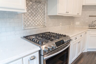 Modern kitchen with a sleek stainless steel gas st