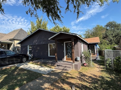 View of front facade featuring brick siding