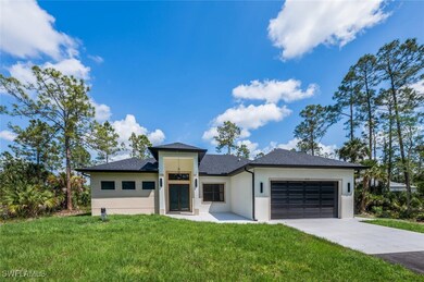Prairie-style house with a front yard, a shingled