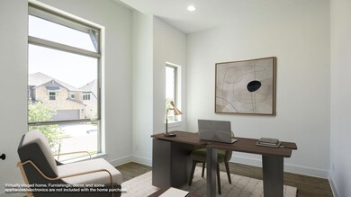 Home office featuring wood finished floors, plent