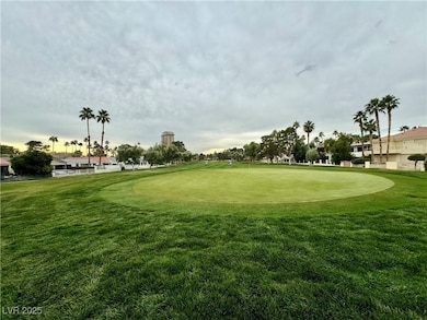 View of property's community featuring a yard