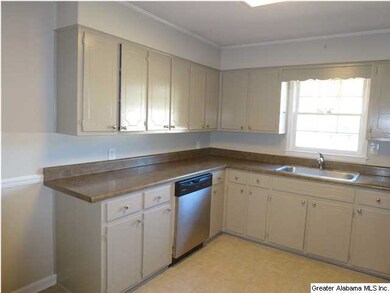 UPDATED KITCHEN WITH NEW COUNTERTOPS AND NEW TILE 