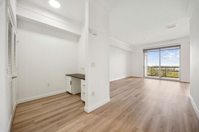 Built in desk and laundry room to the left of the front door