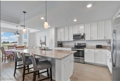 Kitchen featuring pendant lighting, a kitchen isla