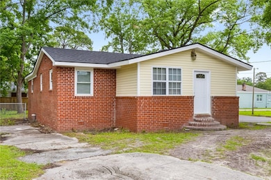 Driveway on left hand side of house