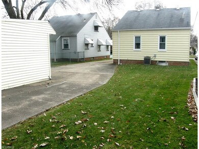 Room for plenty of parking AND space for backyard gatherings.