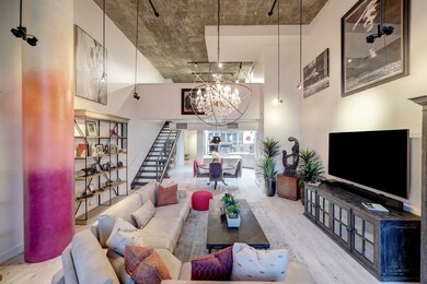 Long shot of the loft style condo with beautiful u