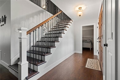 Staircase with wood finished floors
