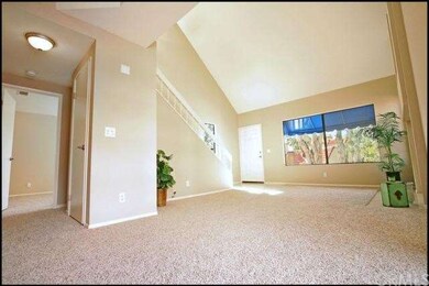Formal dining area opens up to the living room.