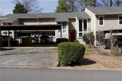 Private Driveway - parking for 4 cars with 2 covered spots