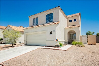 Mediterranean / spanish-style house featuring concrete driveway, a tile roof, an attached garage, stucco siding, and a gate
