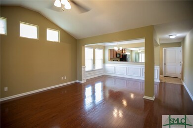 Living Room, through to dining room and kitchen