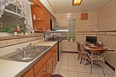 Eat-in Kitchen, Tiled Walls and Floor, Storage