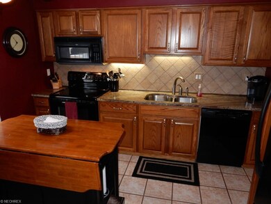 Updated kitchen with granite counter tops, ceramic