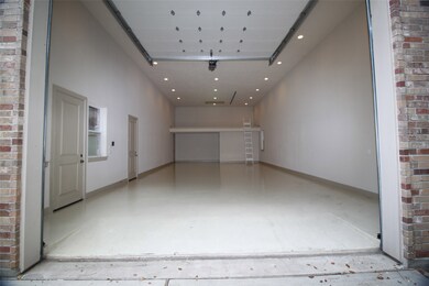 This huge RV garage is complete with a loft for extra storage.