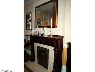 Dining Room - Four fireplaces throughout the home adding lots of character and charm