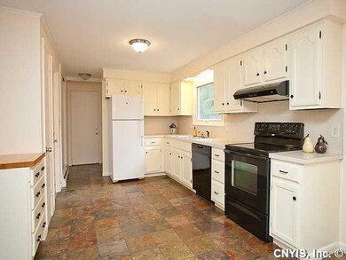 Kitchen and makes for an inviting space to cook, h