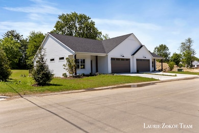 4341 Tallman Woods Dr NW unit 9, Grand Rapids, MI 49534 - photo 2