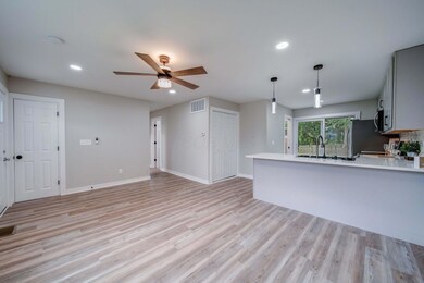 Open and Bright Living/Dining Area!