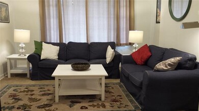 Looking from the dining room to the front living r