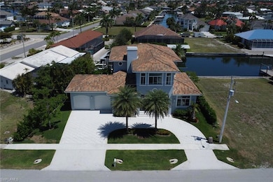 Aerial view of residential area with a nearby body