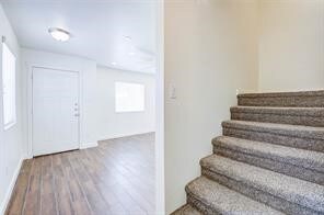 Stairs leading up to the second and third floors.