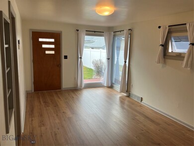 Entrance foyer featuring light hardwood / wood-sty