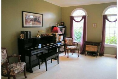 Living Room. Measures 15  X 12  with crown molding