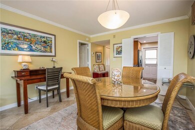 Dining area featuring ornamental molding