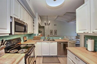 Kitchen featuring appliances with stainless steel 