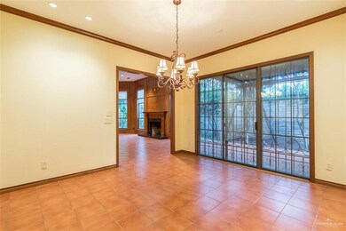 This centrally located, SPACIOUS Dining Room is BIG enough to seat 12 plus a large buffet piece and still have  room left over to access the Back Patio for additional dining, conversation or relaxing.