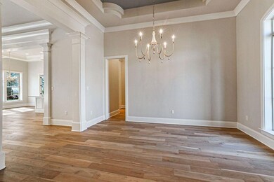 Dining room that opens to den area with view of th