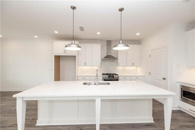 Quartz countertops - End unit, very light and bright -  pictures represent a previously built home, not the actual home.