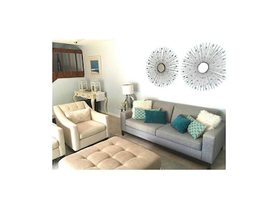 DINING AREA WITH HALF BATH AND LAUNDRY ROOM ON MAI