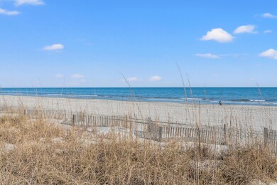 View of water feature featuring a beach view